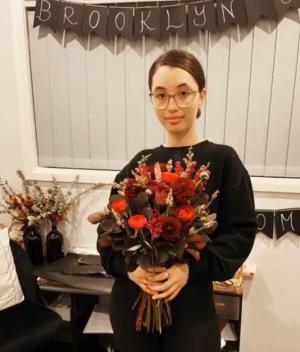 21-YEAR-OLD FLORIST IS BLOOMING MARVELLOUS